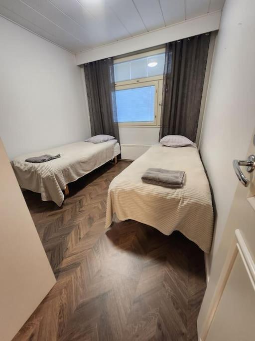 Appartement Rauhallinen Kolmio, Autokatospaikka